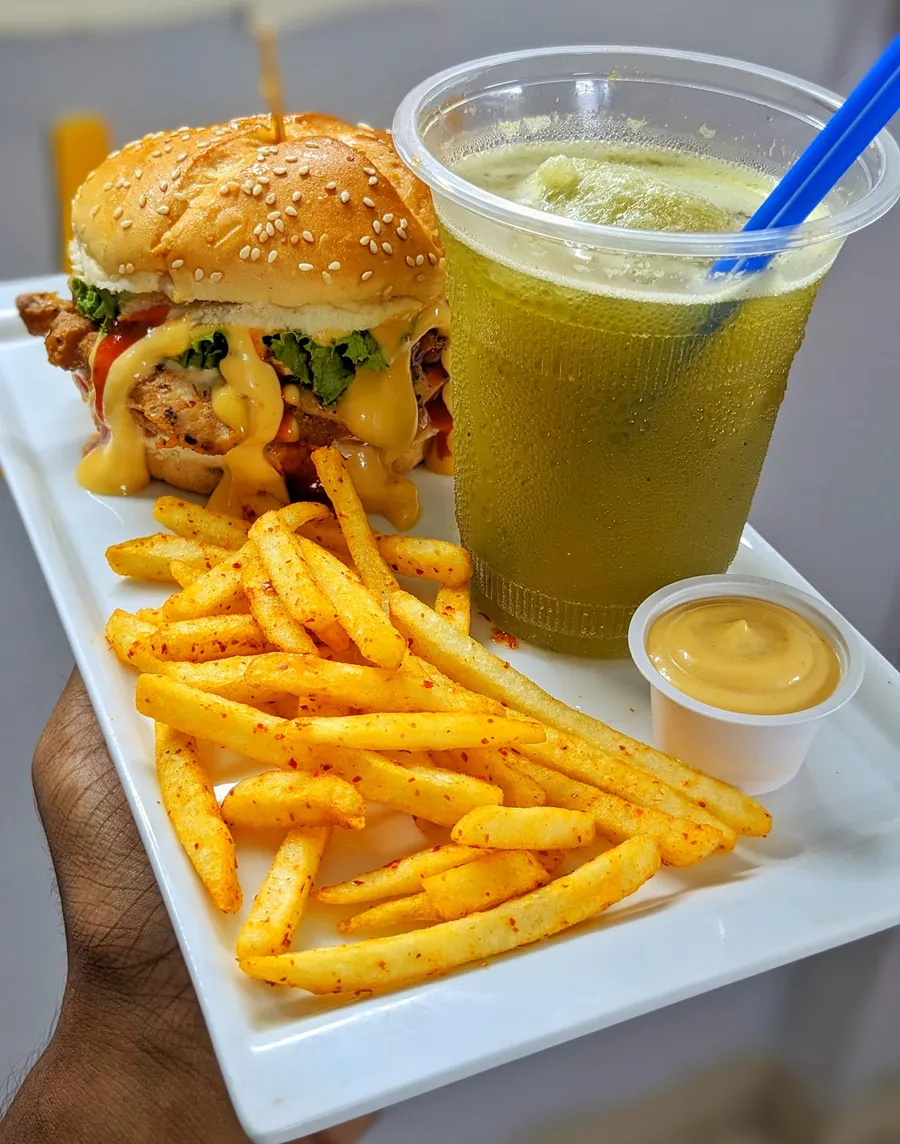 Combo offer Smoky BBQ Chicken Burger + A Portion of The Pabulum Special Fries +  Mint Lemonade +  A small cup of honey mustard sauce at The Pabulum