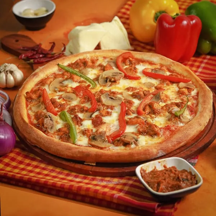 Buy one get one offer on all pizza at Pizza Da Town