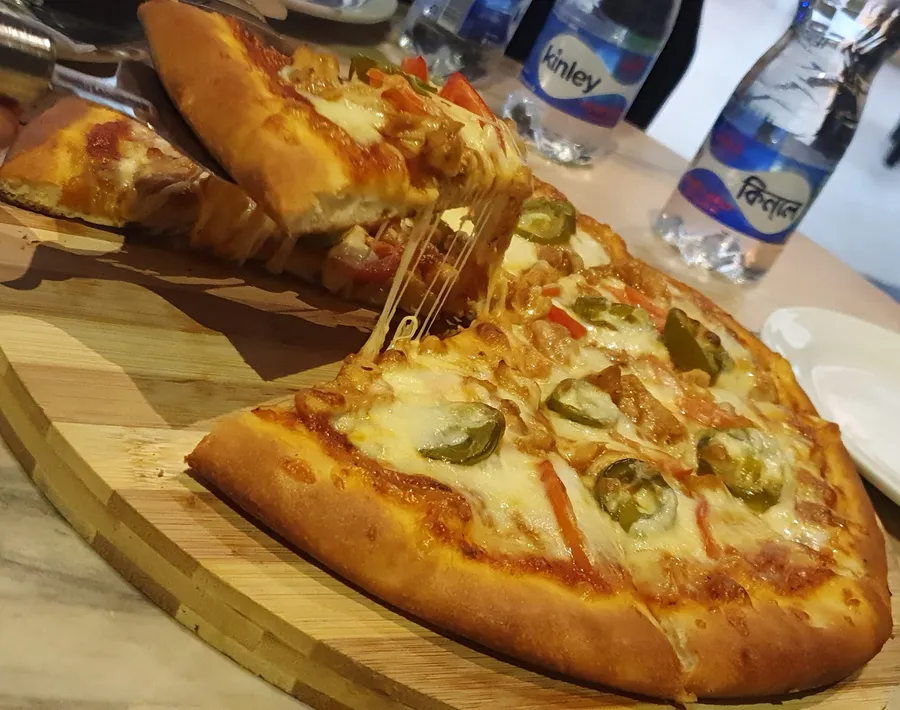 15% Discount On All Pizza at The Grounds Cafe