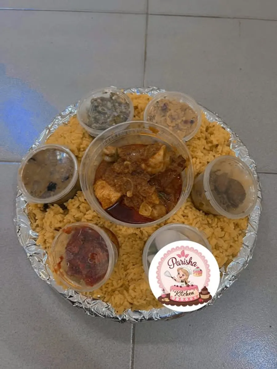 Special Bhuna Khichuri Platter for 2 – With 3 Servings of Rice, 4 Types of Bharta, 5 Pieces of Meat, Salad & Olive Chutney at Parisha kitchen