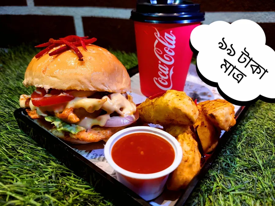 Budget friendly burger combo offer only 99 at Tittle-Tattle Restaurant & Juice Parlor